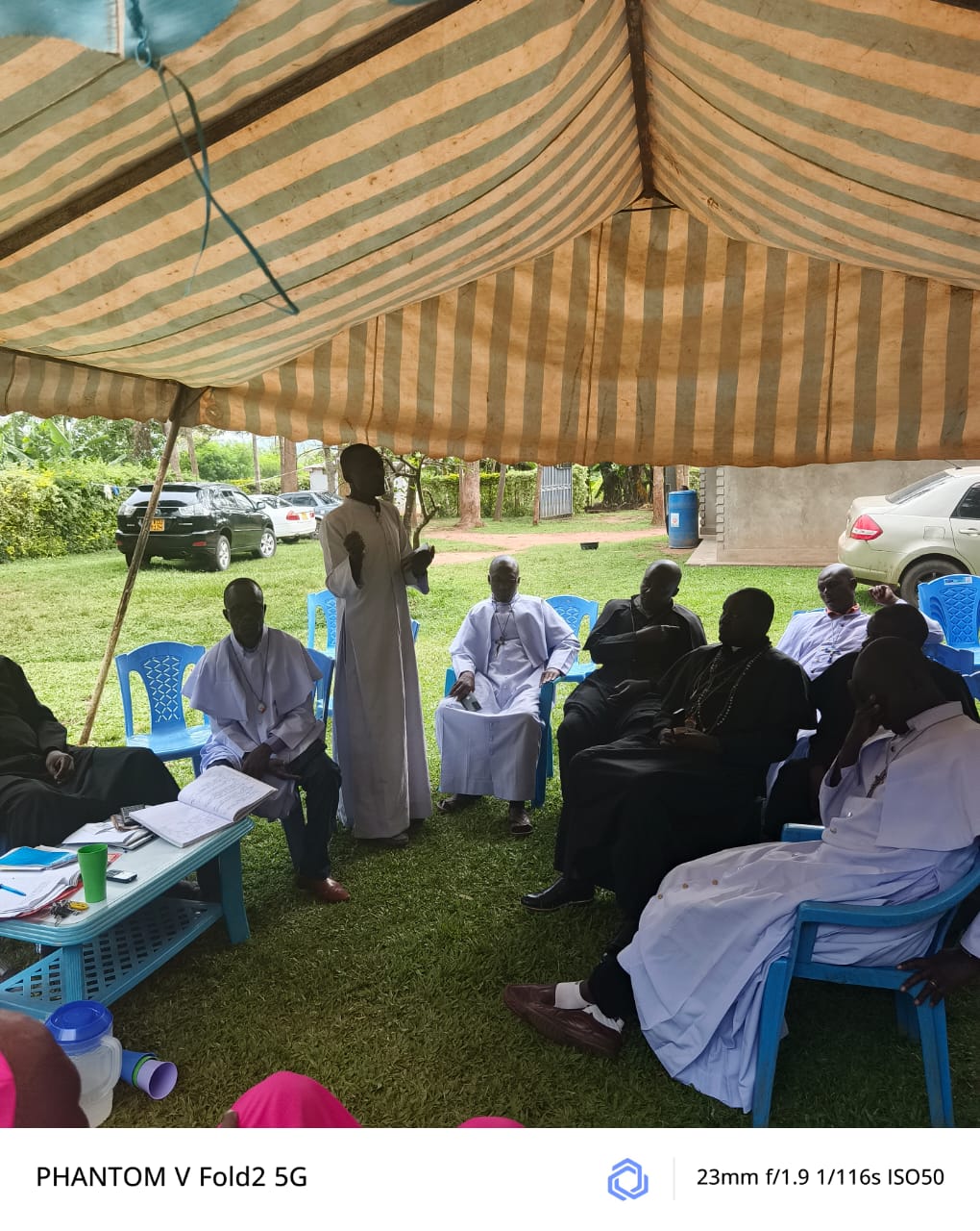 Faith leaders in an outdoor planning meeting