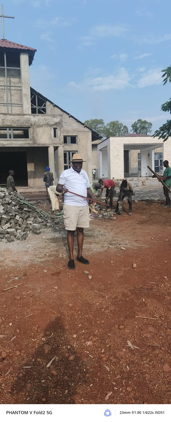 A community member visiting a church development site