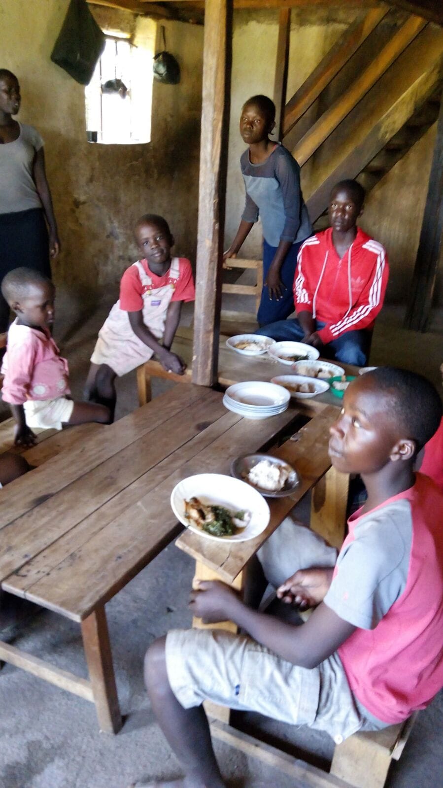Children and young people sharing a meal
