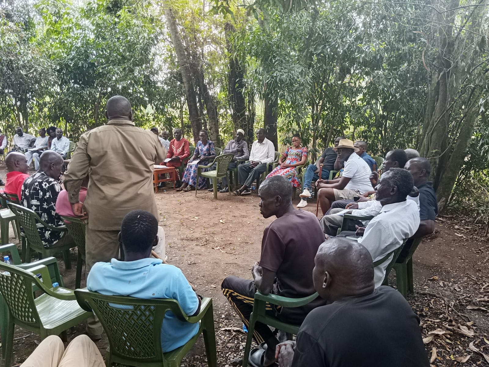 Community members gathered for an outdoor dialogue