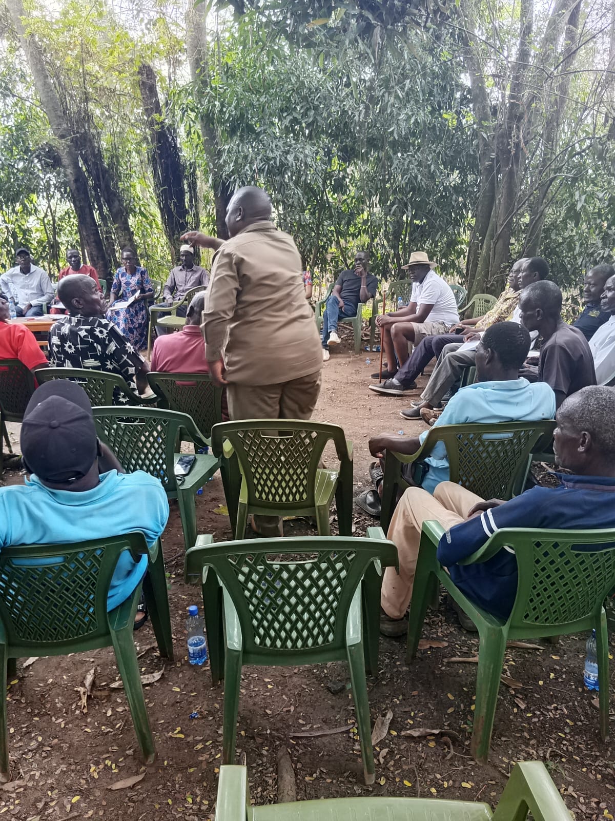A speaker making a point during a community dialogue