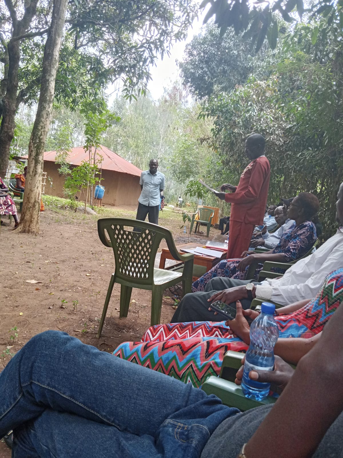 A participant speaking at a community gathering