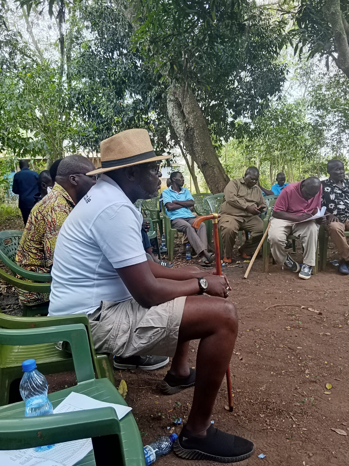 Community members reviewing notes during a meeting