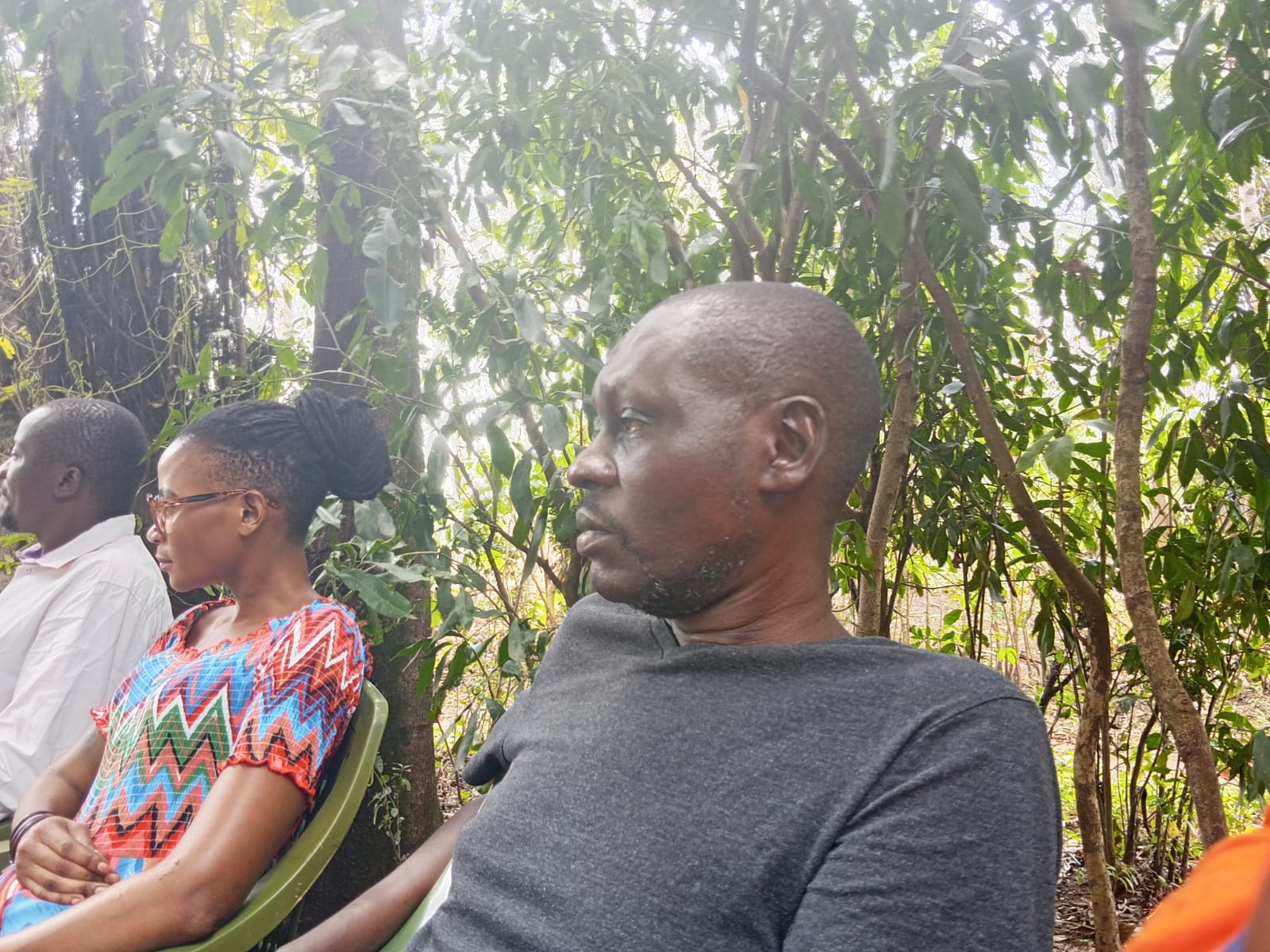 Participants concentrating during an outdoor community session